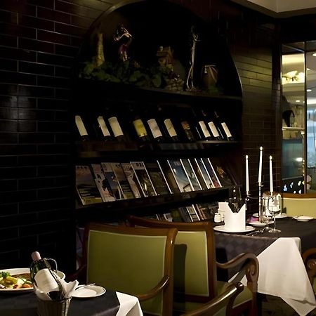 Fenggang Gladden Hotel Tiantangwei Bagian luar foto