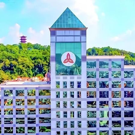 Fenggang Gladden Hotel Tiantangwei Bagian luar foto