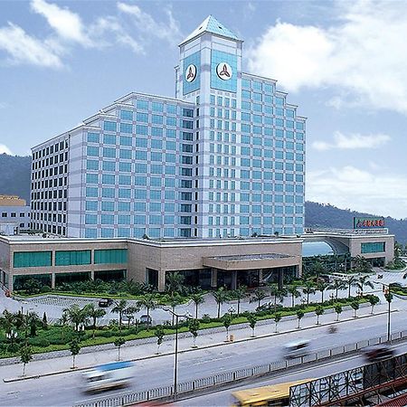 Fenggang Gladden Hotel Tiantangwei Bagian luar foto
