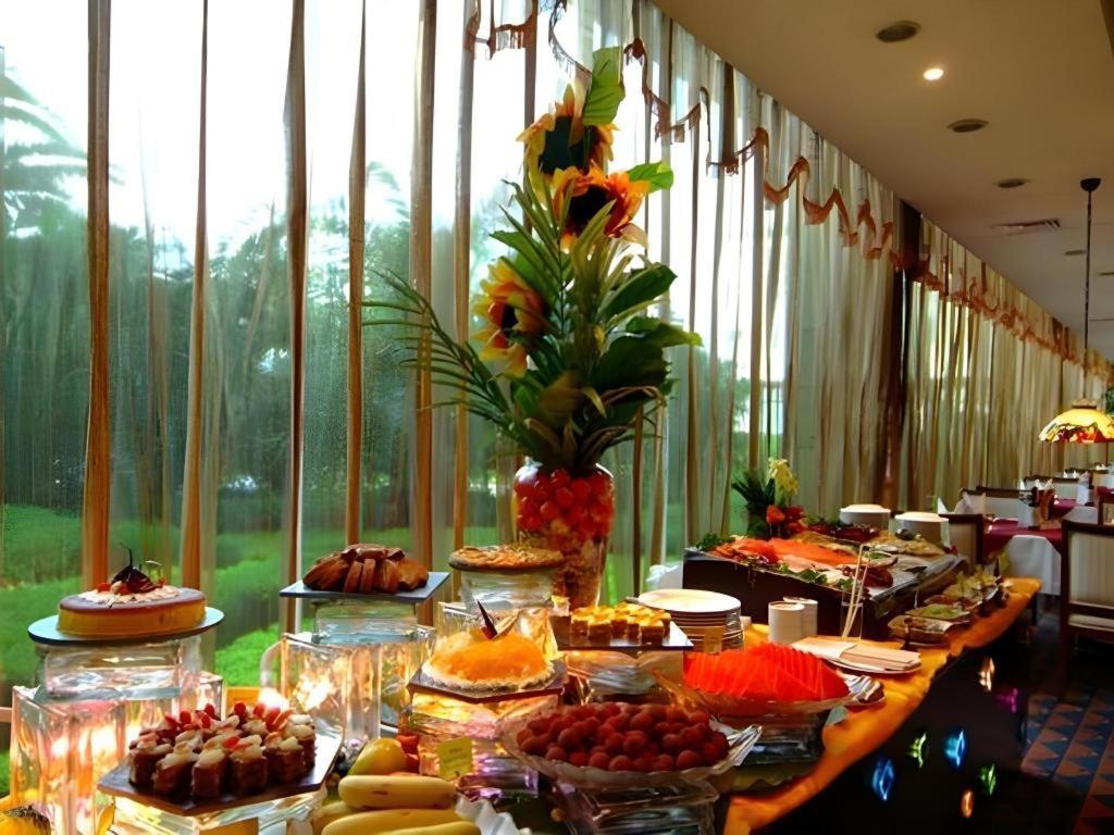 Fenggang Gladden Hotel Tiantangwei Bagian luar foto