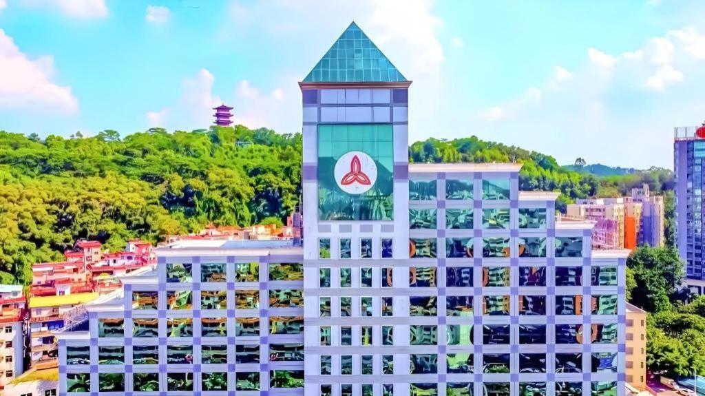 Fenggang Gladden Hotel Tiantangwei Bagian luar foto