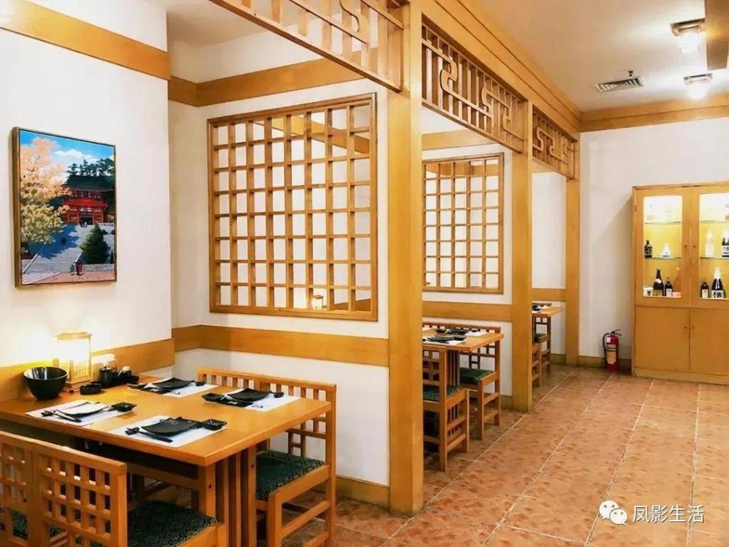 Fenggang Gladden Hotel Tiantangwei Bagian luar foto