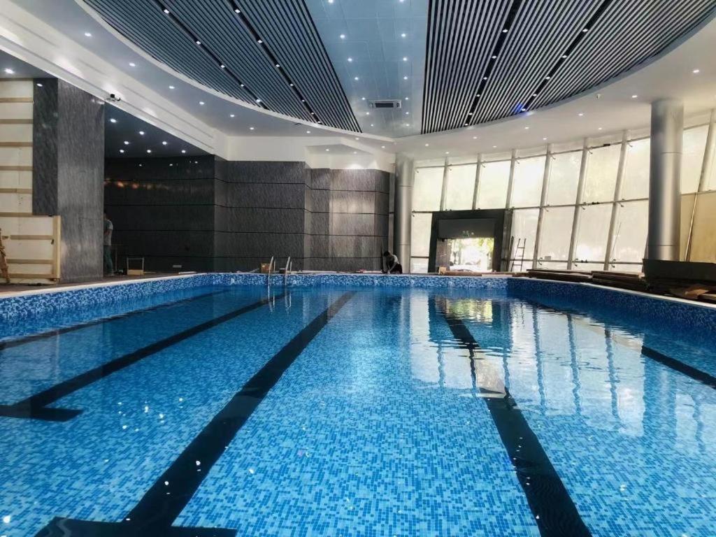 Fenggang Gladden Hotel Tiantangwei Bagian luar foto