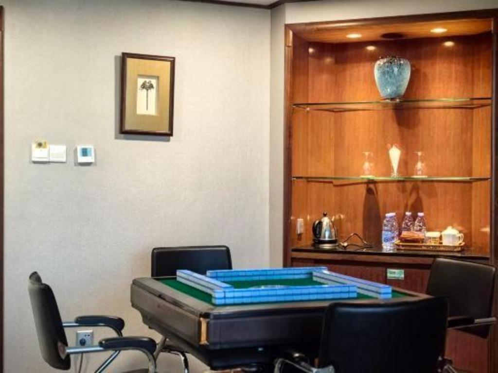 Fenggang Gladden Hotel Tiantangwei Bagian luar foto