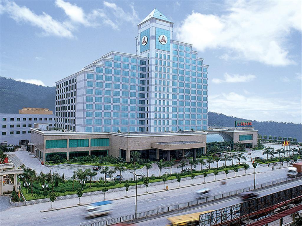 Fenggang Gladden Hotel Tiantangwei Bagian luar foto